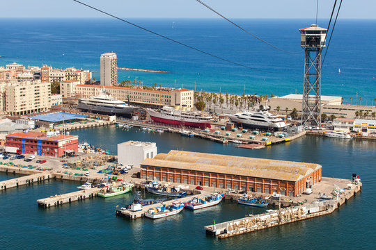Aerial view of the Harbor district in Barcelona, Spain. Panoramic view coastline