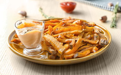 Sweet potato fries on table