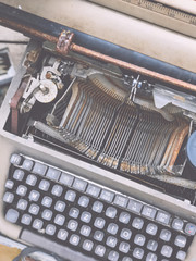 Old retro unnecessary faulty typewriter, professional writer equipment