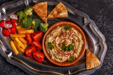 Classic hummus  on the plate.