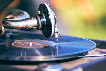 Fototapeta na wymiar Vintage turntable with vinyl disc