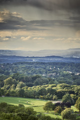 View over the South Downs National Park on a stormy summer day - portrait format