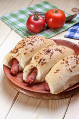 Sausage baked in dough.