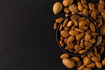 Almonds on a dark background