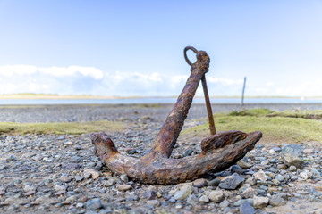 Fototapeta premium Anchor on the estuary at Ravenglass in Cumbria, England, United Kingdom