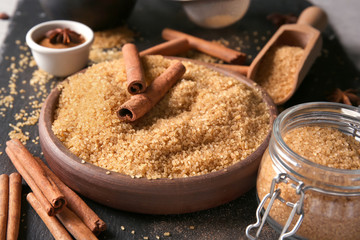 Beautiful composition with sweet cinnamon sugar on table