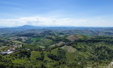 Fototapeta na wymiar Beautiful panoramic view of the Appenins mountains with fields and hills, Italy