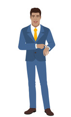 Businessman pointing at his watch