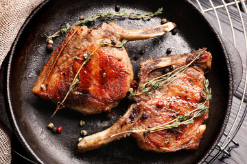 Frying pan with tasty meat, closeup
