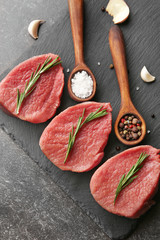 Fototapeta na wymiar Fresh raw meat on slate plate