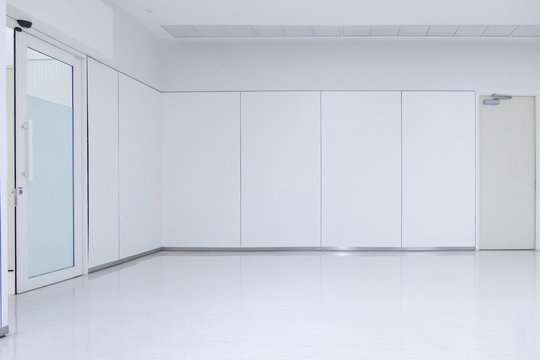 Empty white room with ceiling floor and door, nobody space interior.