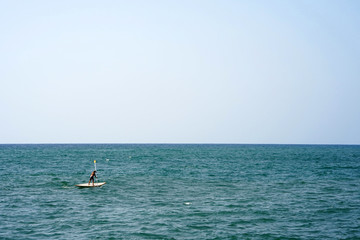 Naklejka premium Stand up paddle boarding