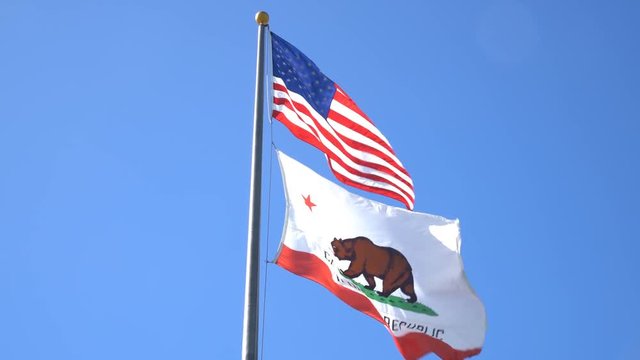 The American and California flag fluttering, photo taken at Santa Monica, Los Angeles County, California, United States