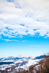 Snow covered mountain and clear blue sky