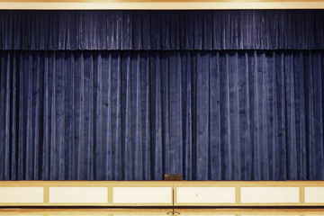 Close up on Blue curtain stage background