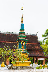 Pagoda in the temple Wat Sensoukaram in Louangphabang, Laos. Vertical. Copy space for text.