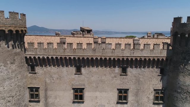 The Orsini - Odescalchi castle in the background of the magnificent lake Bracciano. Italy.