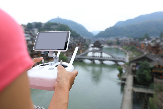 flying drone taking photo of the ancient city in China