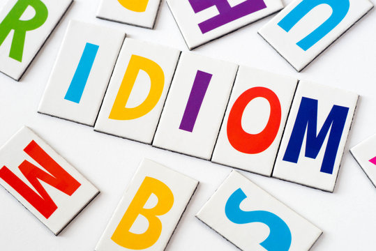 word idiom  made of colorful letters