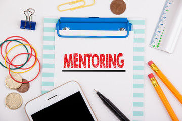 Mentoring. Business Motivation, Success Career concept. Office desk with stationery and mobile phone.