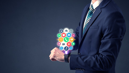 Businessman wearing smartwatch.