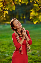 Fototapeta premium Woman dreaming in park