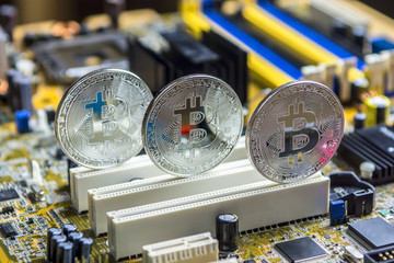 Bitcoins is a silver colour on the motherboard