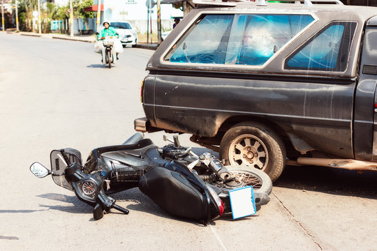 Motorcycle accident collides with car