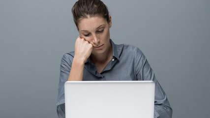 Tired woman sleeping in the office