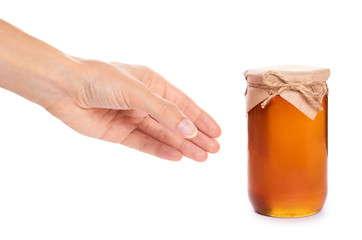 eco home made honey in jar in hand isolated on white background