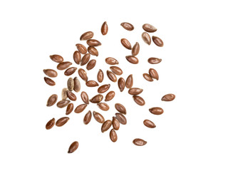 Some linseeds or flax seed spread out on white background seen from above