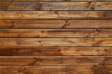 Naklejka premium Background of natural knotted wood fence. Wooden texture.