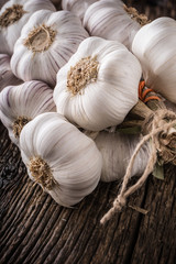 Garlic. Garlic bulbs. Fresh garlic on rustic oak table.