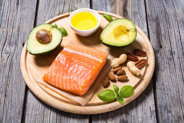 Healthy food vegetables , nuts and salmon