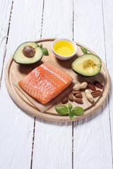 Healthy food vegetables , nuts and salmon