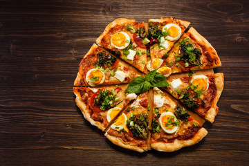 Pizza with egg and pepperoni 