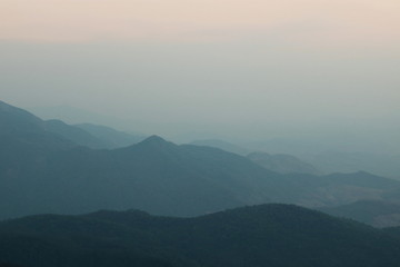 Beautiful twilight layers of silhouettes mountain in Doi inthanon , Chiang Mai , Thailand