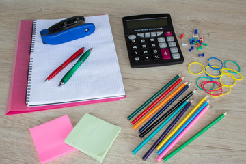 Back to school, education banner with colorful pencils and stationery on wooden table