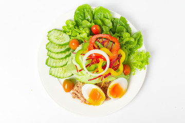 Salad with fresh vegetables, boiled egg and tuna.