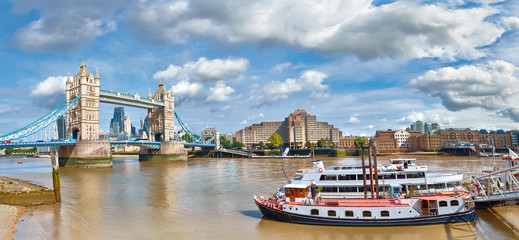 Panoramic image of Tower Bridge in London on a bright sunny day