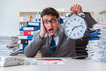 Businessman missing deadlines due to excessive work