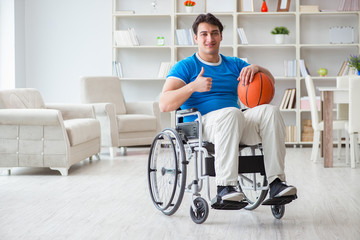 Young basketball player on wheelchair recovering from injury