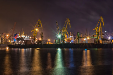 Fototapeta na wymiar Cargo crane at the port of Odessa