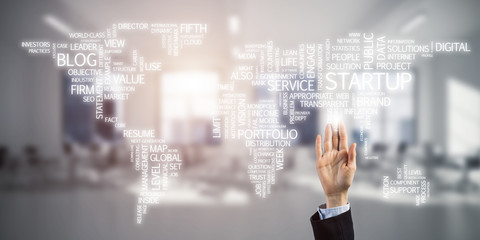 World map in office interior as symbol for international busines