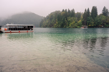Fototapeta premium Pleasure boats on the pier in the Plitvice Lakes national park.