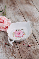 Souvenirs made of porcelain shot in the Studio with marshmallows and flowers. DIY and gift sets