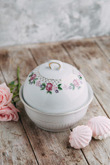 Souvenirs made of porcelain shot in the Studio with marshmallows and flowers. DIY and gift sets