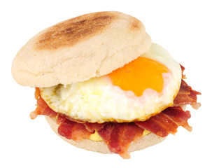 Egg and bacon muffin sandwich isolated on a white background