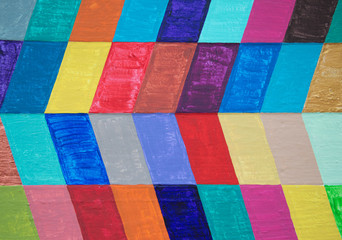 Multicolored chevron pattern on wood background