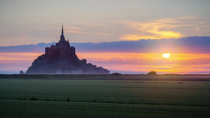 Fototapeta premium Mont Saint-Michel view in the sunrise light. Normandy, northern France